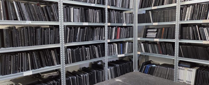 Catalogued shelves of collected laptops awaiting secure recycling at our licensed facility