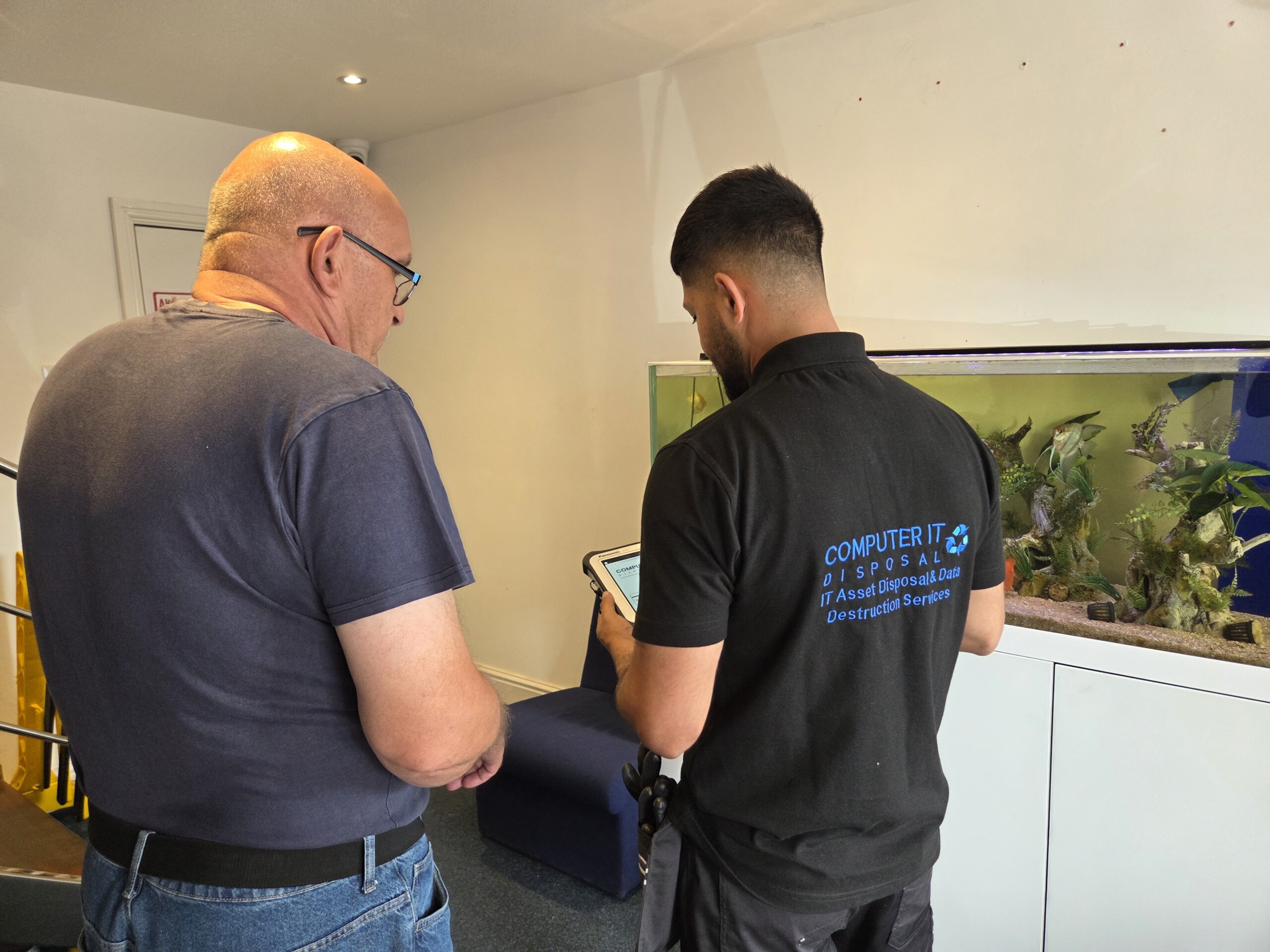 IT equipment disposal engineer visiting client site for collection
