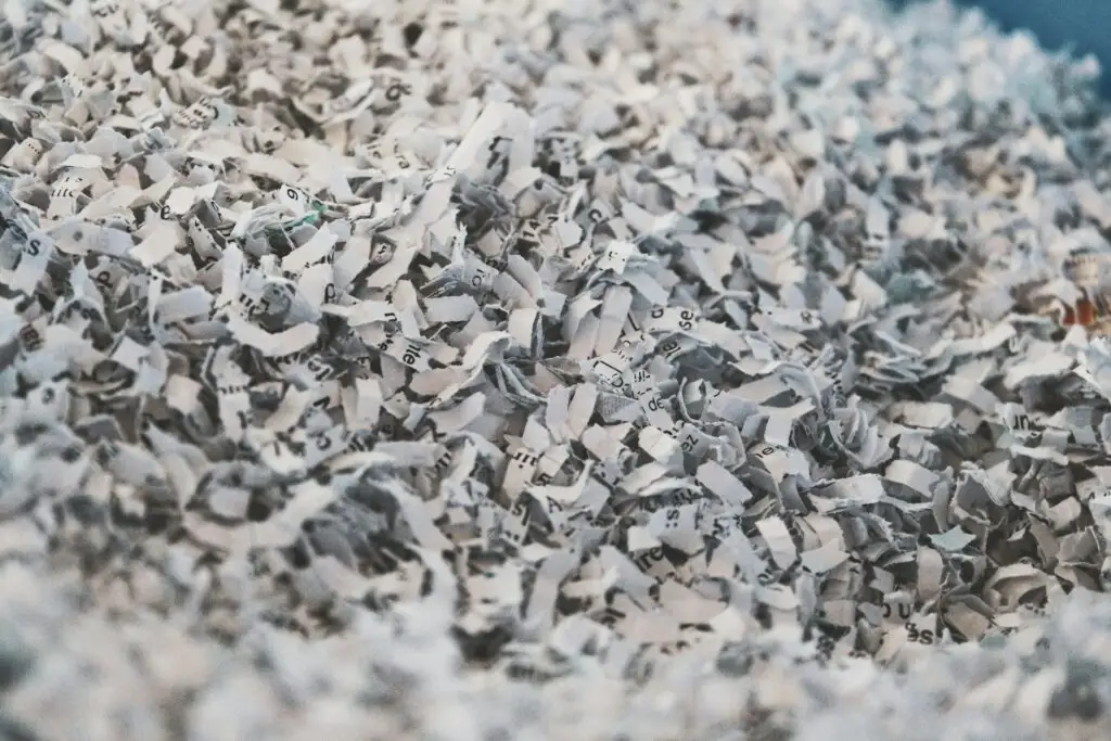 Shredded paper baled for recycling after BS EN 15713 destruction