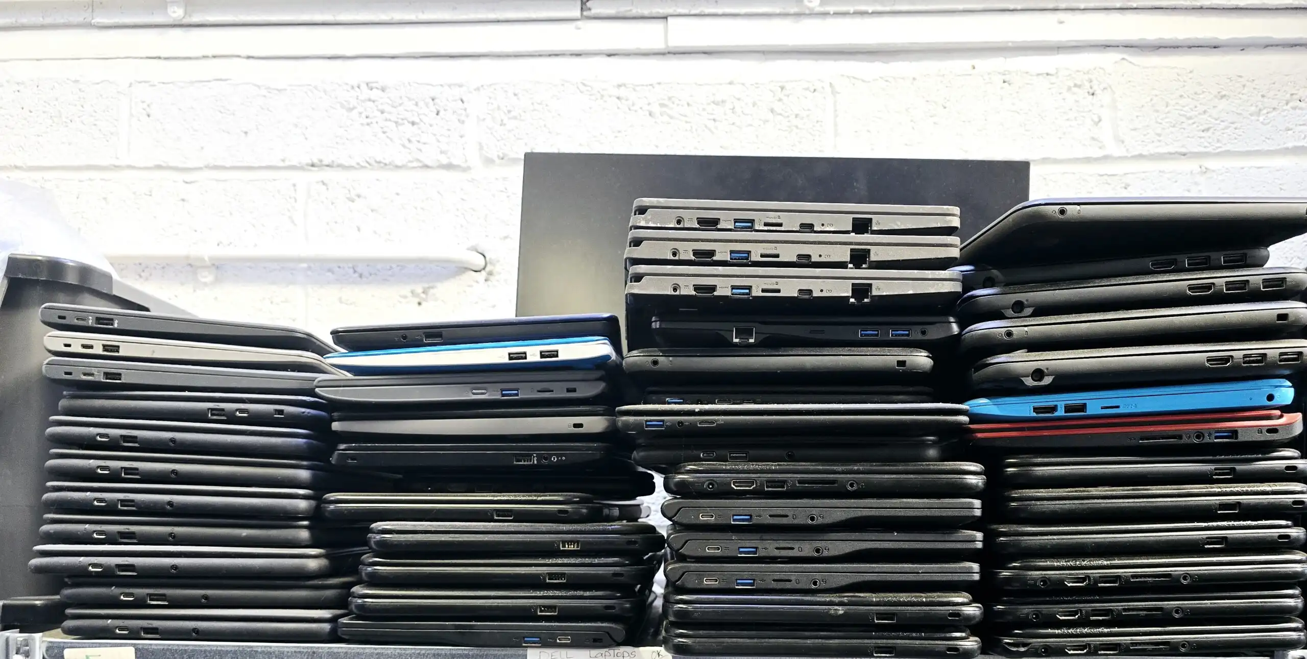 Redundant business laptops awaiting a secure laptop recycling collection
